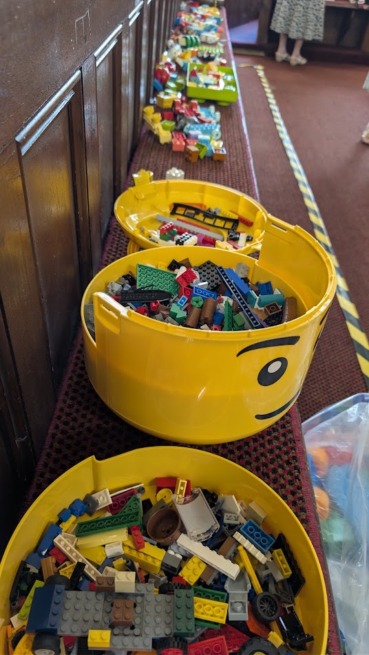 A collection of Lego on a Church Pew